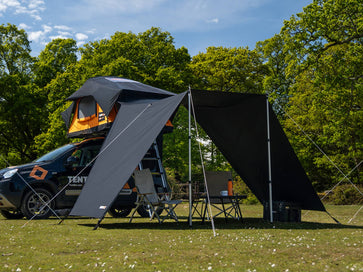 The Lite XL Tunnel Awning installed at the campsite - Accessories