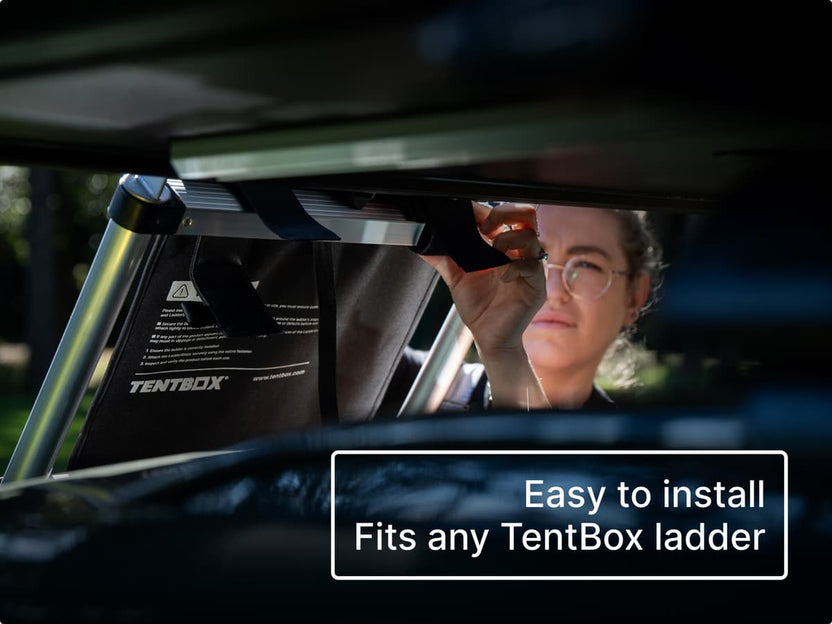 ALS LadderSteps - woman securing her LadderSteps onto her TentBox ladder. Easy to install, fits any TentBox ladder